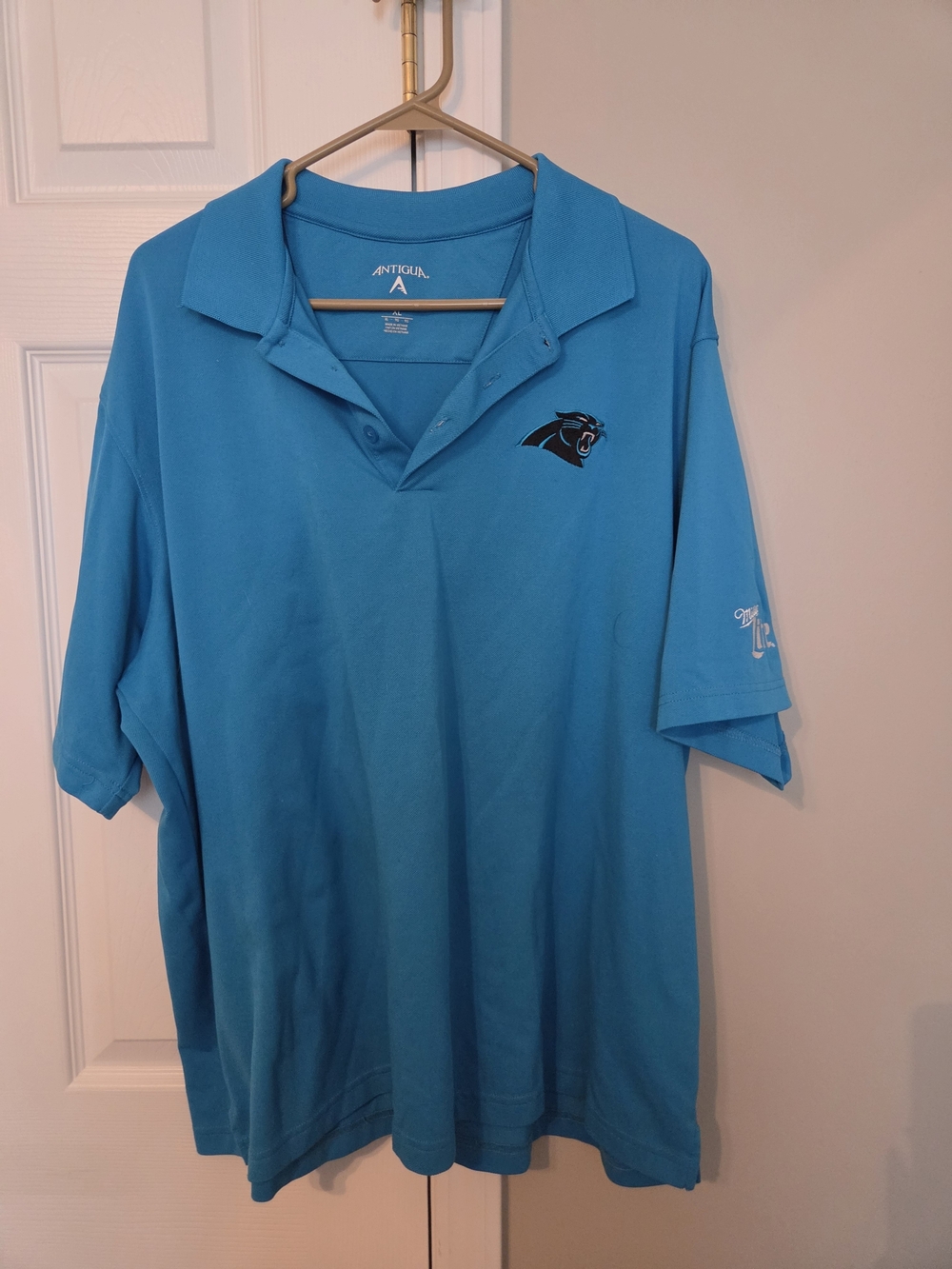 Antigua Men's Carolina Panthers Teal Polo Shirt